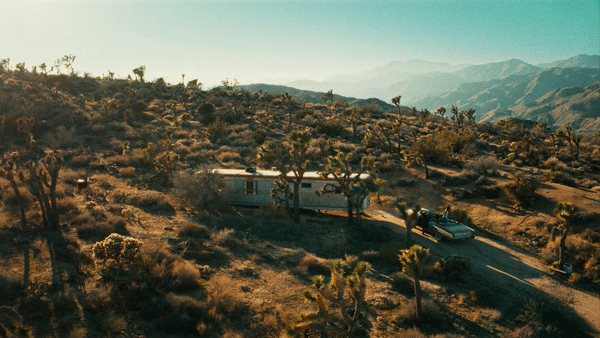 music video production, shooting a music video in the desert. drone shot in the desert